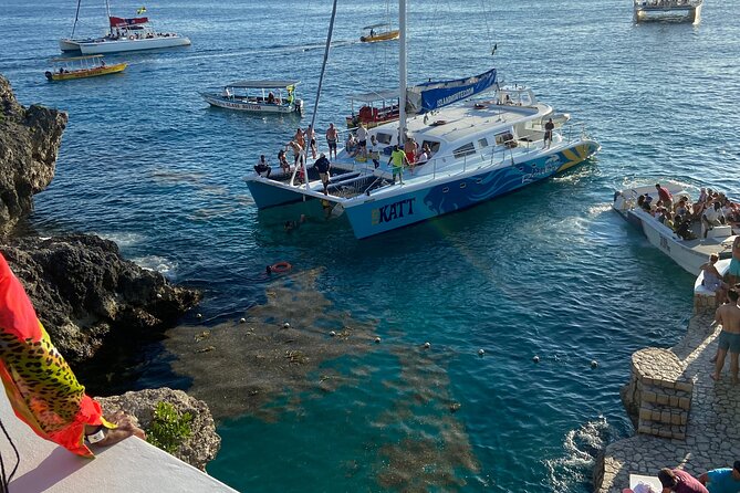 4 Hours Party Boat Catamaran Cruise in Negril - Boarding a catamaran built for a party