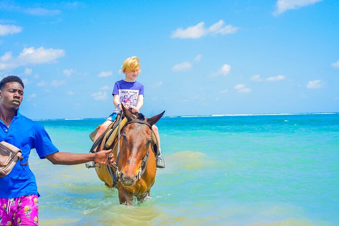 Aqua Fun Tours Dunns Falls, River Tubing and Horse Back - Climbing Dunn’s River Falls in One Hour
