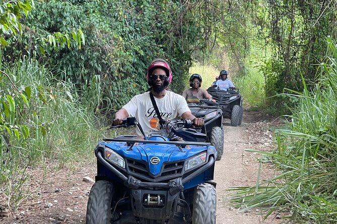 ATV and Bamboo Rafting with Transport from Montego Bay - Who Will Enjoy This Day Most?