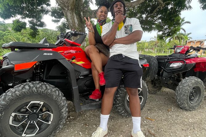 ATV Tour, Limestone Bamboo Rafting and Transportation - Sandy Bay: puddles, forest, and ATV riding