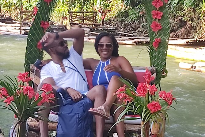 Bamboo Rafting Adventure with Limestone Massage from Montego Bay - Music, coconuts, food, and the floating bar