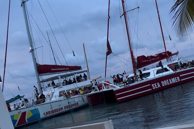 Bamboo Rafting, Catamaran Party Cruise and Snorkeling in Jamaica - Guides, drivers, and the human side of the tour