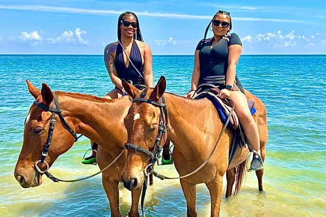 Bamboo Rafting, Dunns River , Zipline And Horseback Ride Combo - Horseback riding from a private garden to the beach