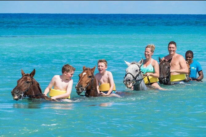 Bamboo Rafting & Horseback -dunns river Transportation Included - A calm start on Jamaica’s river