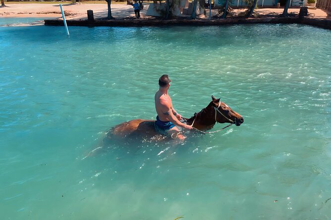 Bamboo Rafting & Horseback Ride n Swim Guided Tour In Montego Bay - Should you book the bamboo rafting and horseback swim tour?