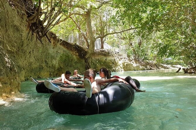 Bamboo Rafting & River Tubing Tour Ocho Rios(Entry Fee Included) - The bamboo raft and the raft captain