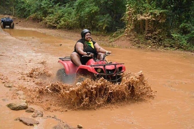Blue Hole and ATV'S Ride Tour From Ocho Rios & Runaway Bay - Getting muddy at the Rio Nuevo ATV course