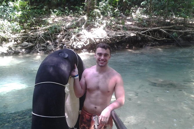 Blue Hole and River Tubing from Montego Bay - The craft market and Jamaican jerk lunch stop