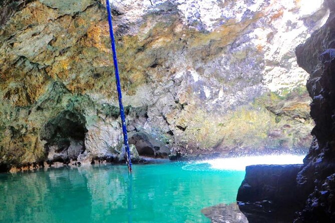 Blue Hole Mineral Spring and Rick's Cafe - Two Jamaican water stops with very different moods