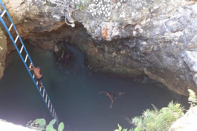 Blue Hole Mineral Spring and Rick's Cafe - Entering the 35-foot Blue Hole