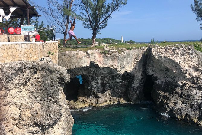 Blue Hole Mineral Springs, Rick's Café, and Shopping Combo Tour - Rick’s Café for cliff jumping and sunset