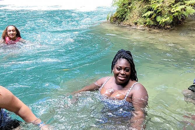 Blue Hole & River Tubing Tour From Falmouth & Runaway Bay Jamaica - Ocho Rios Jerk Centre: a 45-minute Jamaican food stop