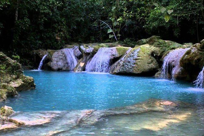 Blue Hole Secret Falls and River Tubing Private Tour - Cool Blue Hole: the active first stop