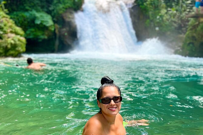 Blue Hole Waterfalls and Bamboo Rafting with Transportation - Calypso rafting adds an easygoing river pause