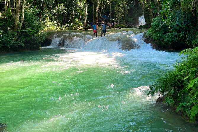 Blue Hole Waterfalls and Bamboo Rafting with Transportation - White River rafting and the parish boundary