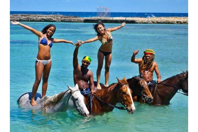 Dunn's River Falls and Horse Back Riding Excursion - Climbing Dunn’s River Falls, one wet step at a time