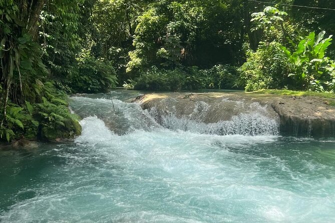 Dunn's River Falls & Blue Hole Tour from Montego Bay - Dunn’s River Falls turns a waterfall into a stairway