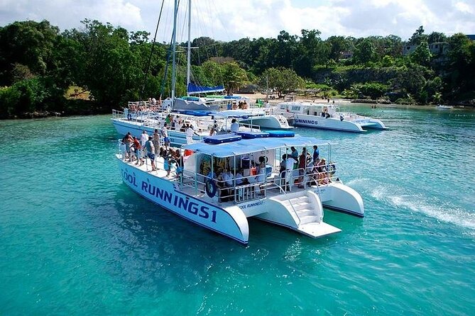 Dunn's River Falls Party Cruise, Blue Hole with Snorkeling, free beverages - The catamaran turns transport into a party