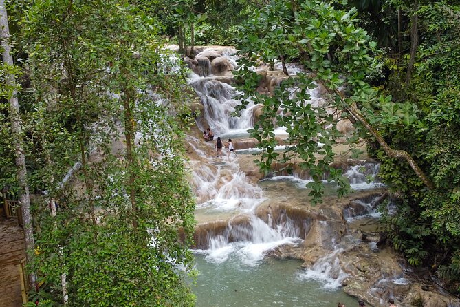 Dunns River Falls, Rafting, Zipline & Horseback from Montego Bay - Shopping time can help or slow the day