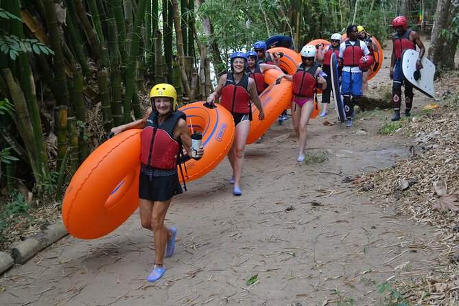 Falmouth Waterfalls River Tubing and Beach Adventure - From tubes to raft near the Caribbean Sea
