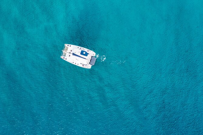 Family Catamaran Cruise from Jamwest Beach Negril Hotels - Rick’s Cafe and the famous cliff setting