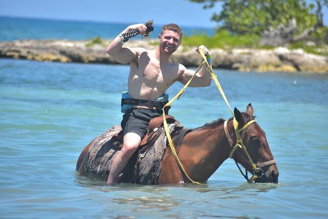 Full Day Private ATV with Zipline and Horseback Riding in Negril - Ziplining over the Caribbean