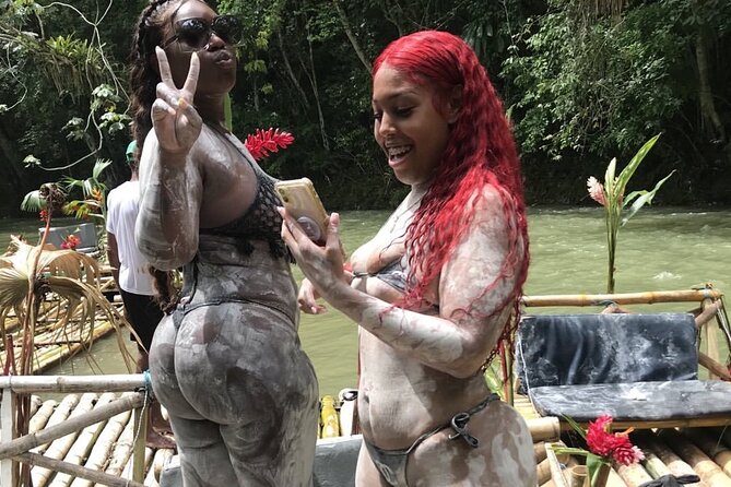 Great River Bamboo Rafting and Limestone Full Body Massage Tour From Montego Bay - Coconut Water, Sugar Cane, and Riverbank Vendors