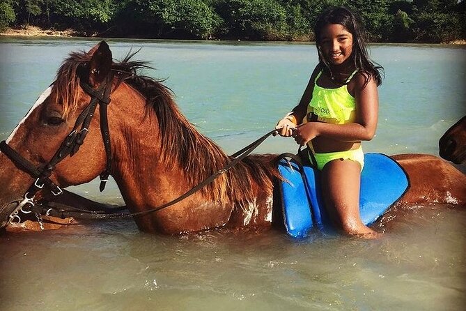 Horseback Riding, ATV and Ocean Zip lining combo from Montego Bay - Jamaican lunch, with one timing concern