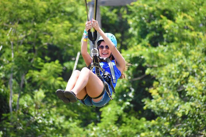 Jamwest: Zipline, Cultural Ride, and ATV Off-Road Adventure - Starting above the trees on the Reggae Zip-Line Challenge