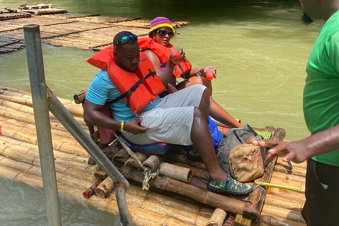 Martha Brae Bamboo Rafting Experience From Montego Bay - Coconut, Red Stripe, and the relaxed finish