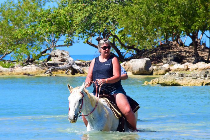 Negril 45-minute Guided Horseback Ride and Swim - Riding into the Caribbean Sea