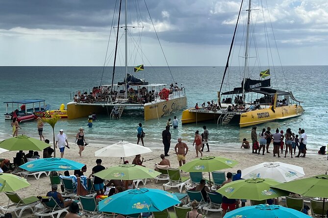 Negril 7 mile Beach, Party Catamaran Cruise , Snorkeling and Ricks Cafe Combo - The day at a glance