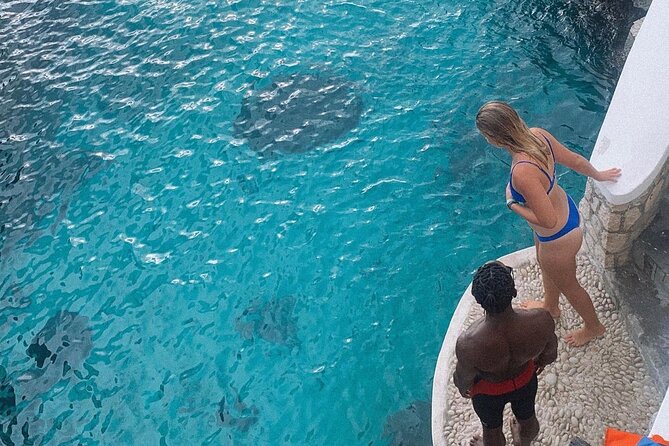 Negril 7 mile Beach, Party Catamaran Cruise , Snorkeling and Ricks Cafe Combo - Rick’s Cafe and Negril’s famous sunset