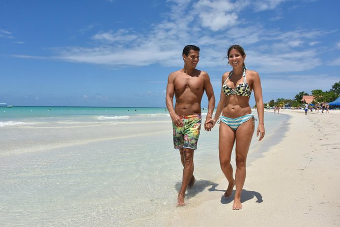 Negril Highlights Catamaran Cruise With Stop At Margaritaville - A party boat with a view of Seven Mile Beach