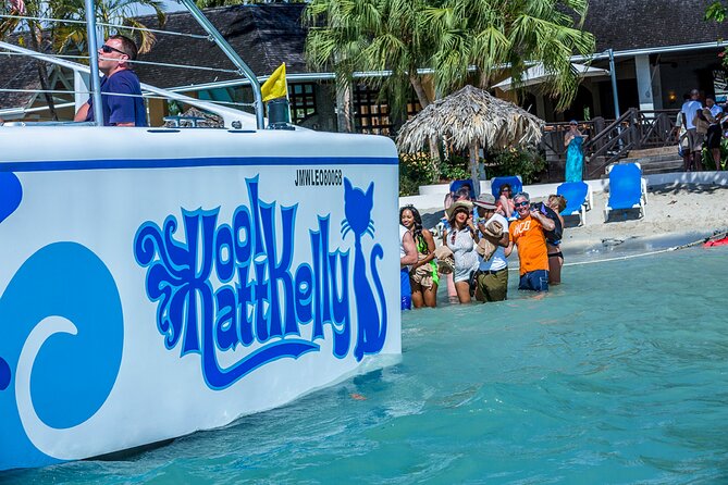 Negril Highlights Catamaran Cruise With Stop At Margaritaville - Margaritaville: food, beach time, and extra costs