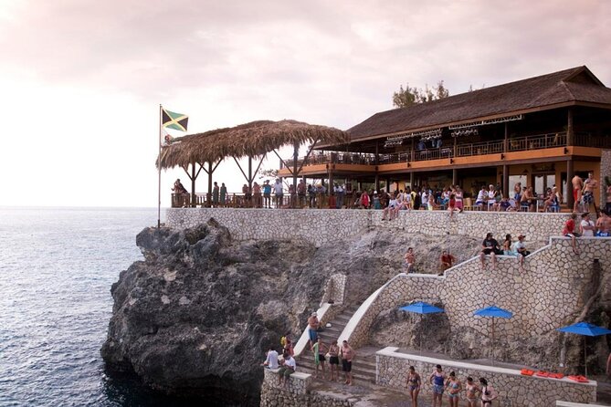 Negrils Seven Miles Beach, Rick's cafe and Parasailing Tour. - From Montego Bay to Lucea by air-conditioned vehicle
