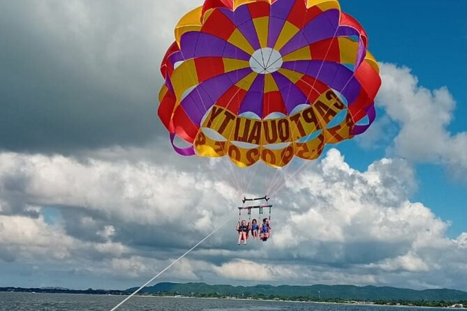 Negrils Seven Miles Beach, Rick's cafe and Parasailing Tour. - Lucea adds local color before the beach