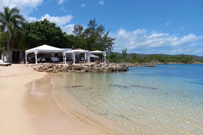 Ocho Rios: River Tubing, Lunch and Cocktails at Bamboo Beach Club - Bamboo Beach Club: lunch, chairs, and Caribbean water