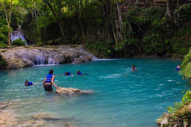 Ocho Rios Water Action Package (Blue Hole, Tubing & Dunns River) - Starting at Dunn’s River Falls for a 600-foot climb