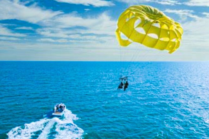 Parasailing above Turquoise Ocean Waters in Montego Bay - Who Will Enjoy This Most?