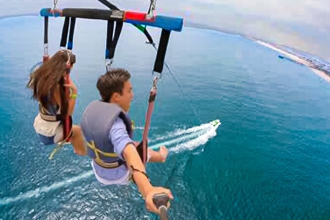 Parasailing above Turquoise Ocean Waters in Montego Bay - Arriving, Changing, and Getting Ready
