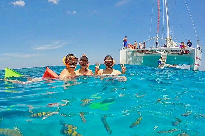 Party Catamaran Cruise with Open Bar and Snorkeling Montego Bay - Music, dancing, and the Jamaican party atmosphere