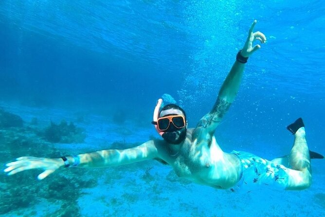 Party Catamaran Cruise with Open Bar and Snorkeling Montego Bay - A possible Margaritaville stop