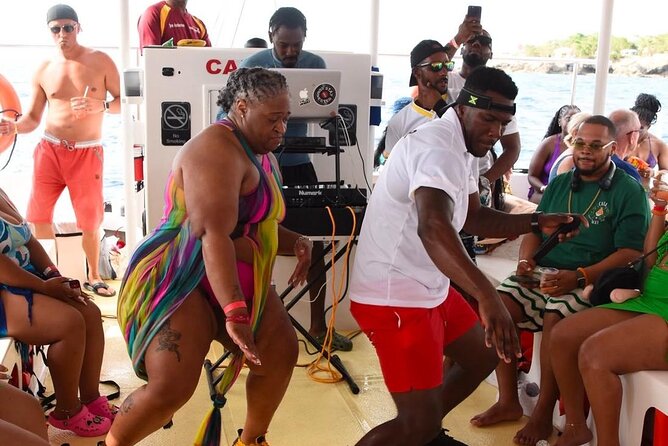 Party Catamaran: OpenBar, Music, Negril Beach, Caves, Snorkeling - Rick’s Cafe, cliff jumping, and sunset plans