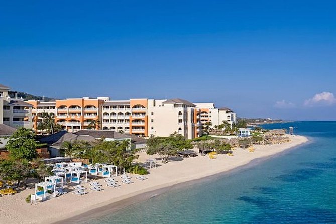 Private Roundtrip Airport Transfer to Iberostar Resorts - Leaving Sangster Airport with a name sign