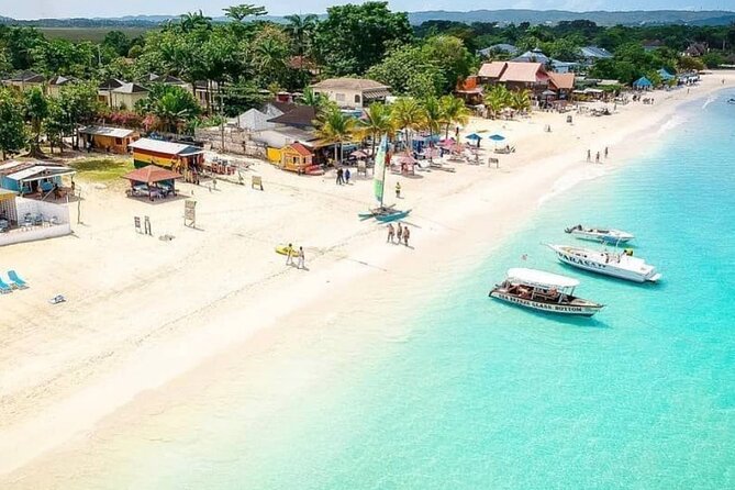 Private Tour of Negril Beach and Sunset at Ricks Cafe - Margaritaville Negril and the long white beach