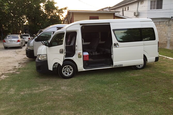 Private Transfer from Sangster Airport to Montego Bay Hotels - A small Jamaican welcome: Red Stripe and water