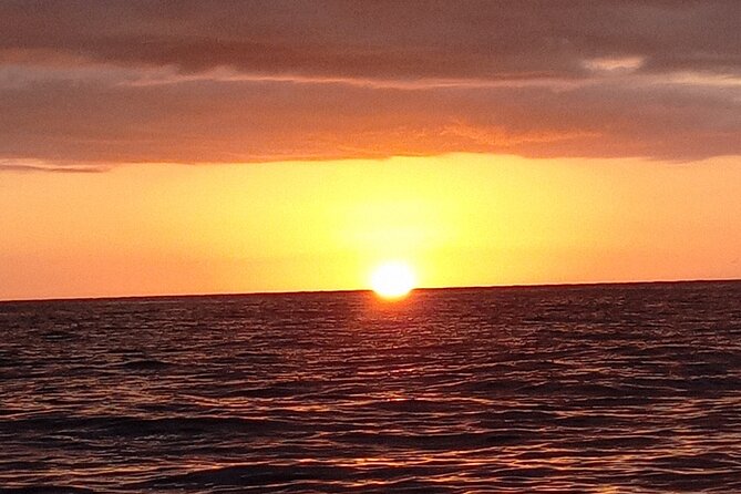 Rick's Cafe Sunset Cruise - Snorkeling at Sandy Cay Reef near Seven Mile Beach