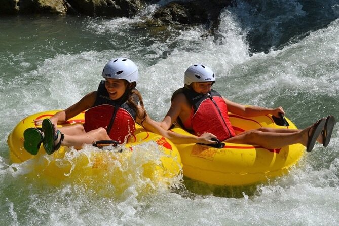 River Rapids Tubing and Beach Visit with Private Transportation - Tubing through the Rio Bueno