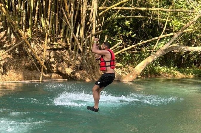 River Rapids Tubing and Beach Visit with Private Transportation - Kayaking or paddling toward the beach